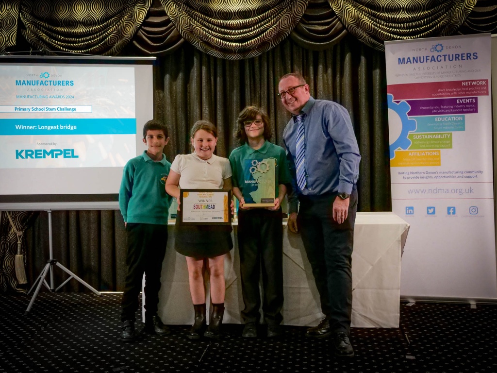 Southmead School collecting their 2024 winners certificate and trophy for the NDMA STEM challenge